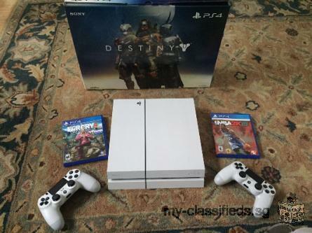 White PS4 with 2 games and extra controller
